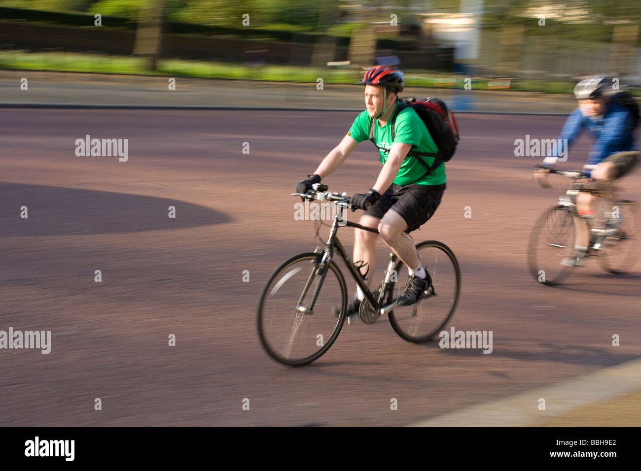 Movement shot of a cyclist riding along Stock Photo - Alamy