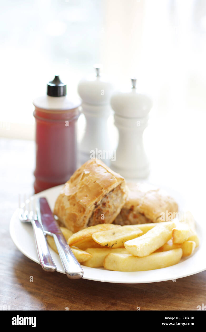 Authentic British Style Sausage Roll With Chips Served On A Plate With No People Stock Photo Alamy