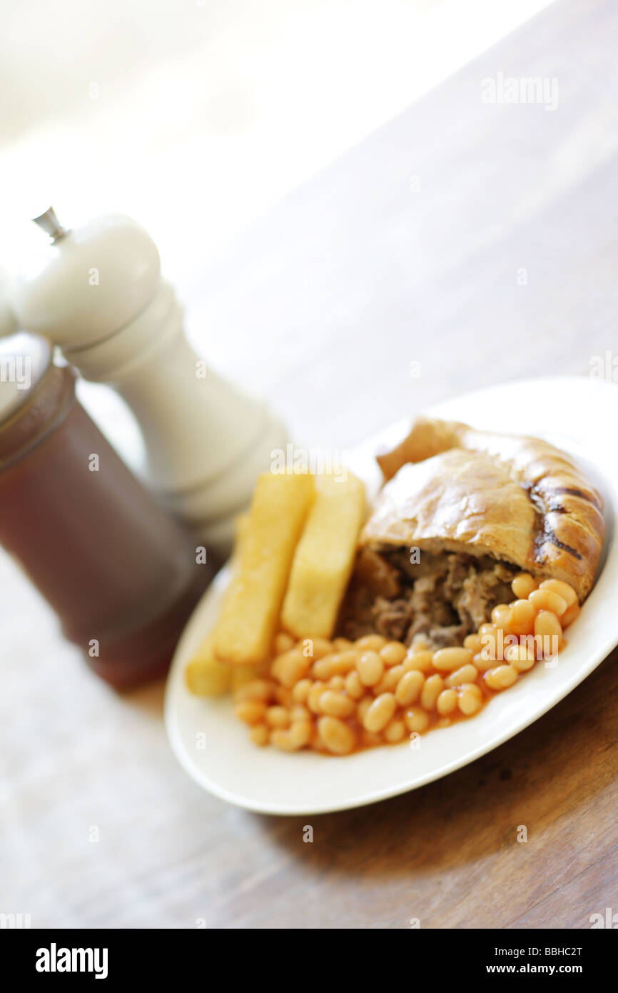 Pasty with Chips and Beans Stock Photo - Alamy