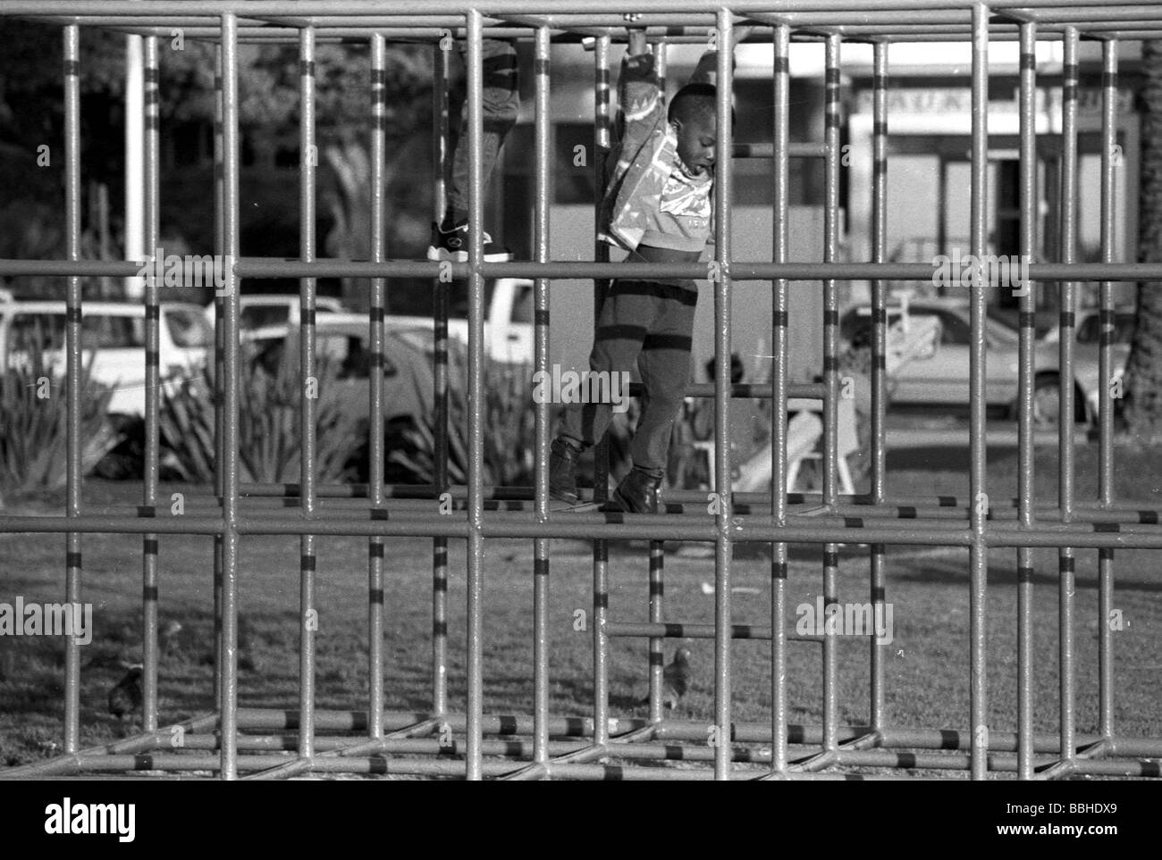 Cape Town South Africa 1997 black children boys kids playing junglegym
