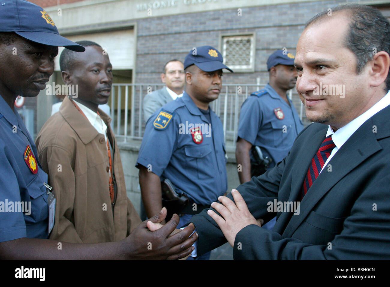 Convicted bussinessman Schabir Shaik thanks court officials and police personnel before leaving the Durban High court on 8 June Stock Photo