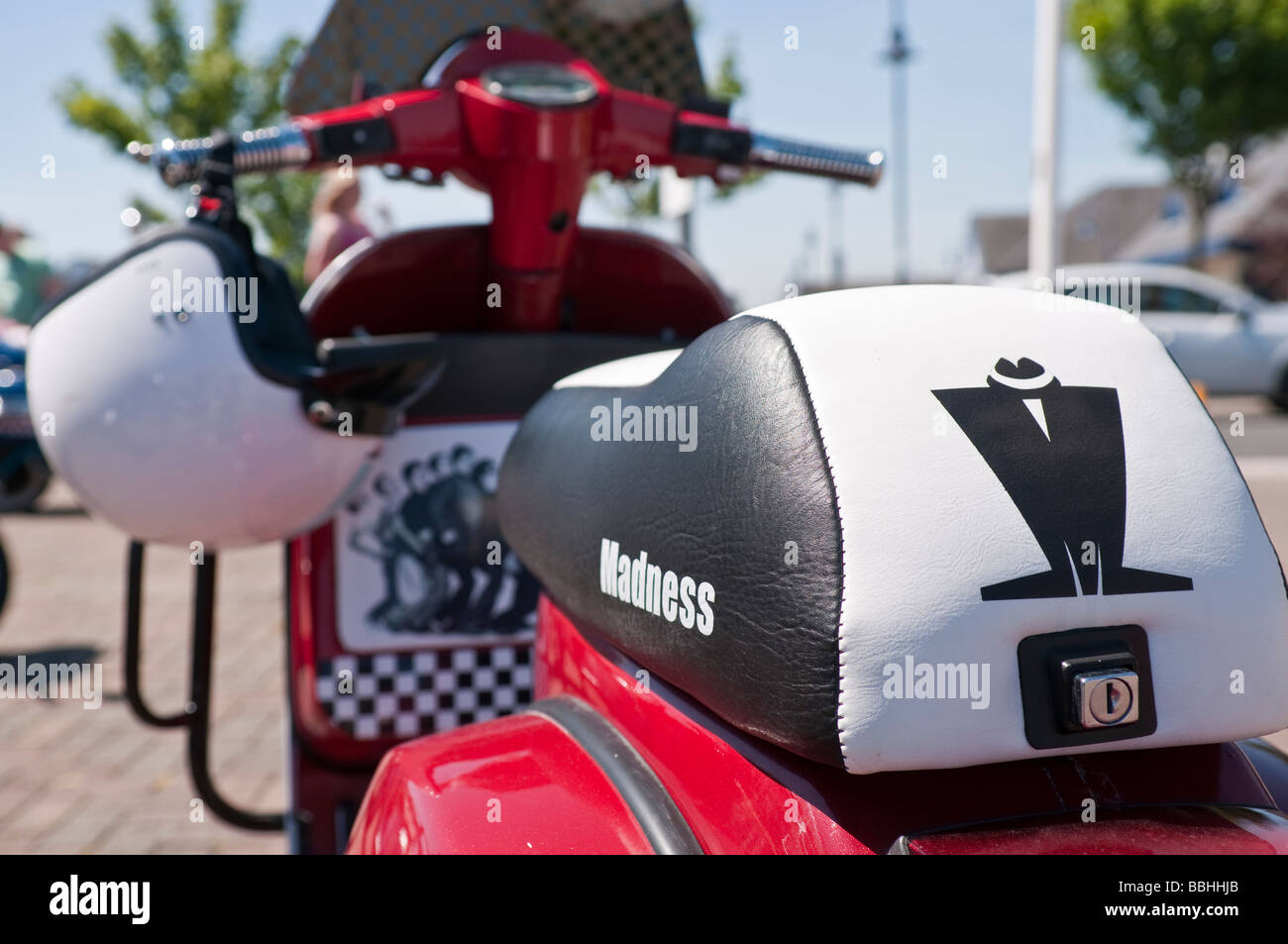 Vespa scooter, customised with logos and images of the pop/ska band, Madness Stock Photo