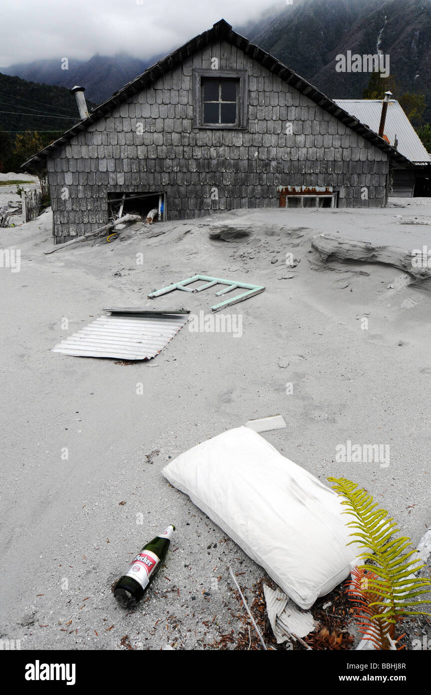 A destroyed house in the abandoned town of Chaiten after the volcanic eruption Stock Photo