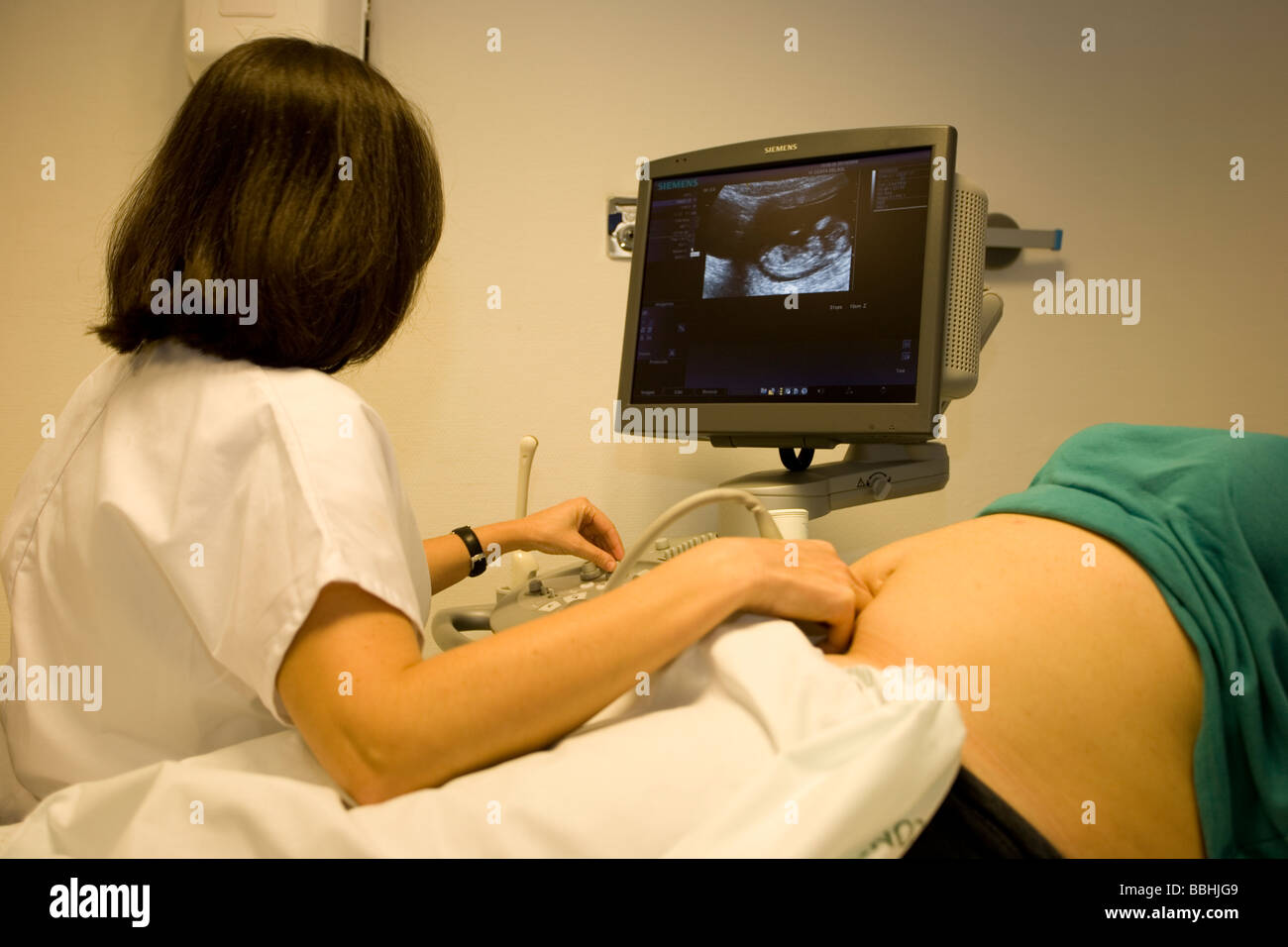 ultrasound scan to a pregnant woman Stock Photo