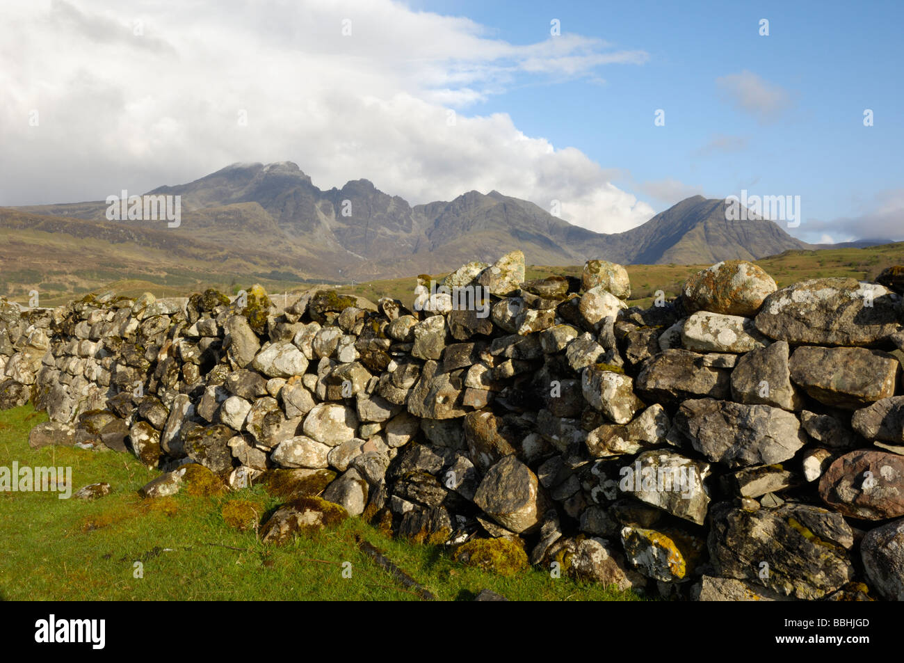 Drystone wall (or dyke) and Cullins, Isle of Skye, Scotland Stock Photo