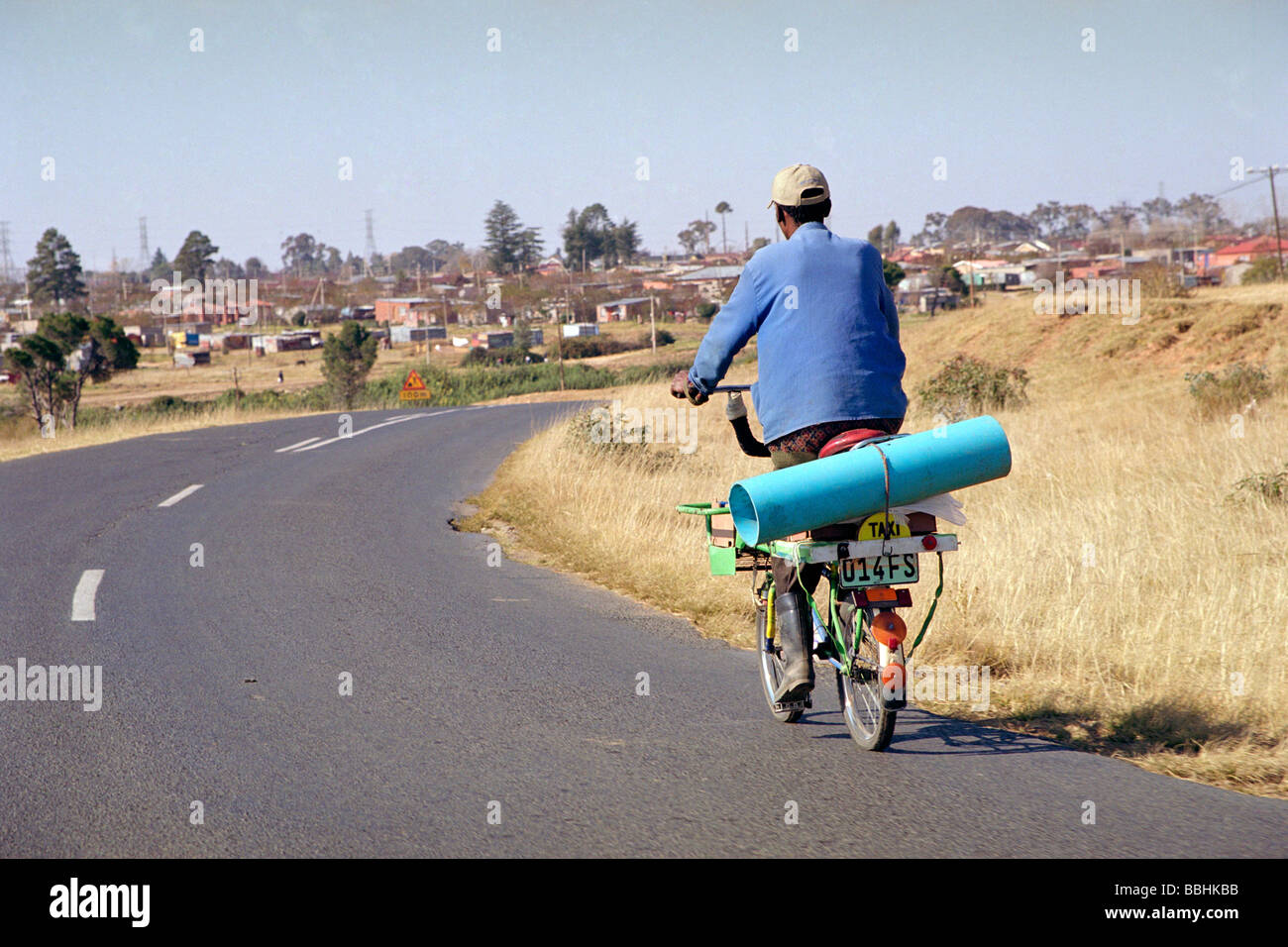 Phineas Hlazane lives in Clocolan a little town in the Eastern Freestate South Africa Sound Caption 20050527Clocolanbike amr Stock Photo