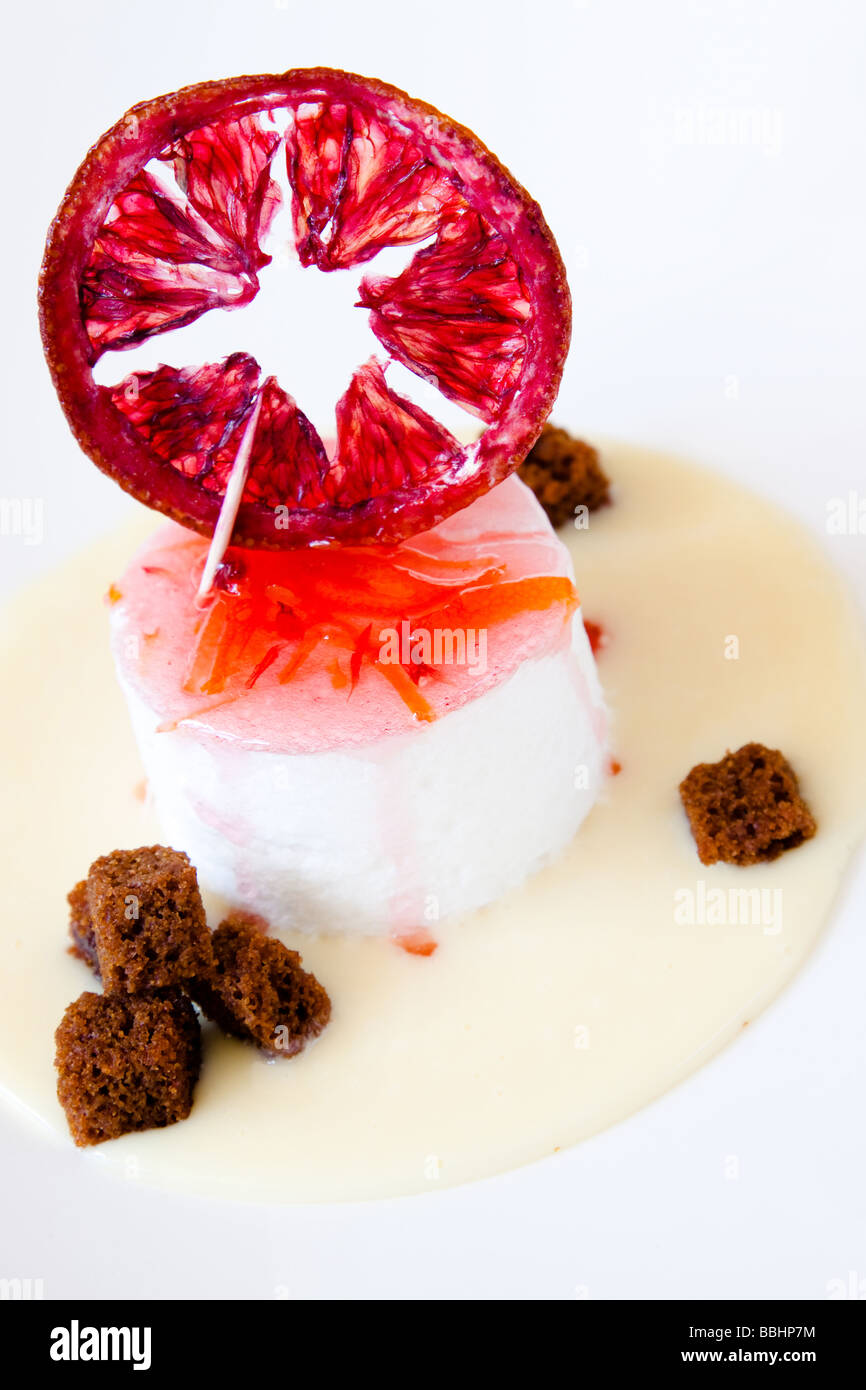 An exotic dessert made with raspberry flavour and ice cream Served with