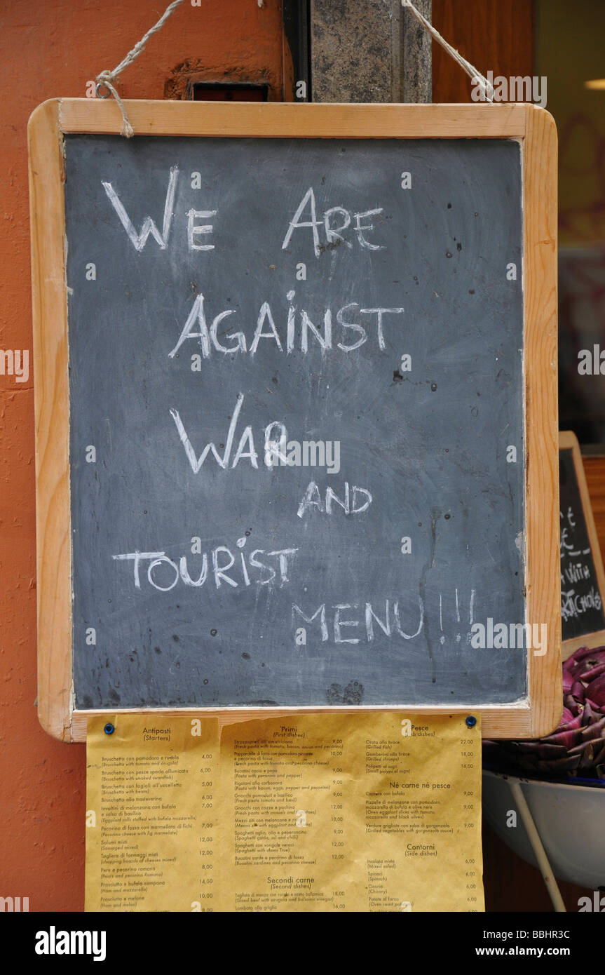 Sign with the inscription 'We Are Against War And Tourist Menu', Travestere, historic district, Rome, Italy, Europe Stock Photo