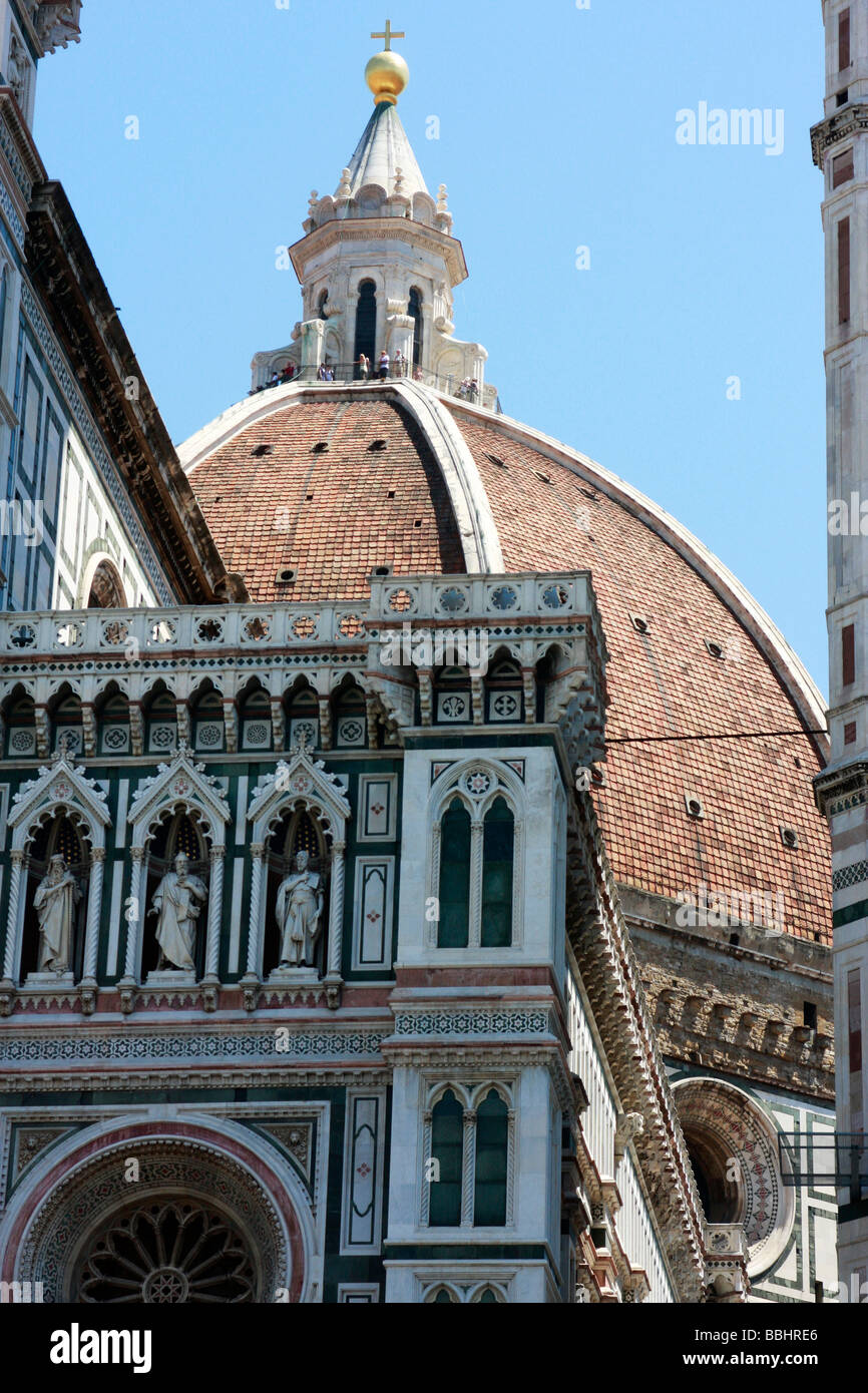 visitors climb to the top of the Dome to overlook the marble facade of Santa Maria del Fiore Cathedral (The Duomo) in Florence Stock Photo