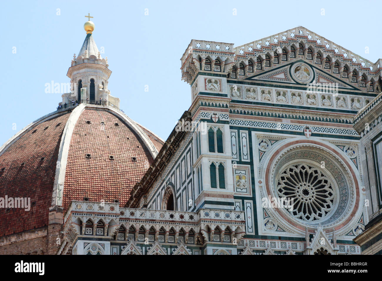 visitors climb to the top of the Dome to overlook the marble facade of Santa Maria del Fiore Cathedral (The Duomo) in Florence Stock Photo