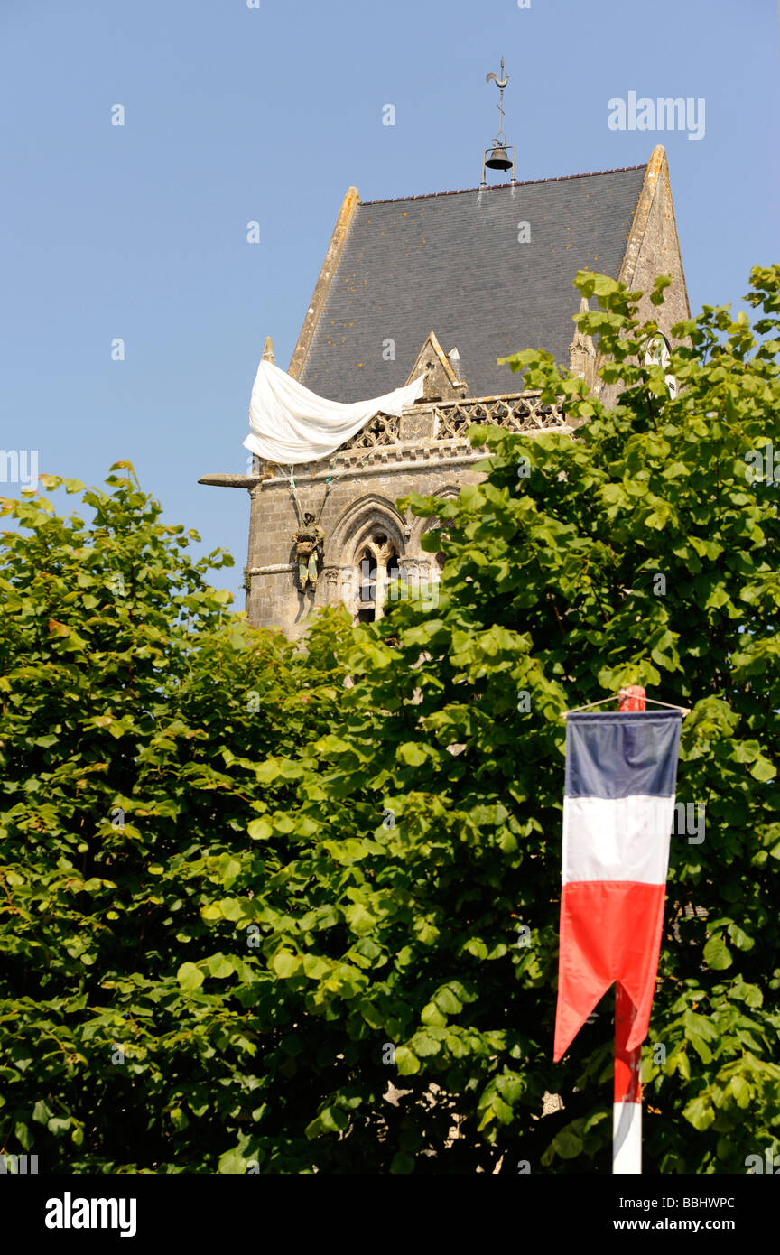 D Day US parachutist John Steele on the church at Sainte Mere Eglise