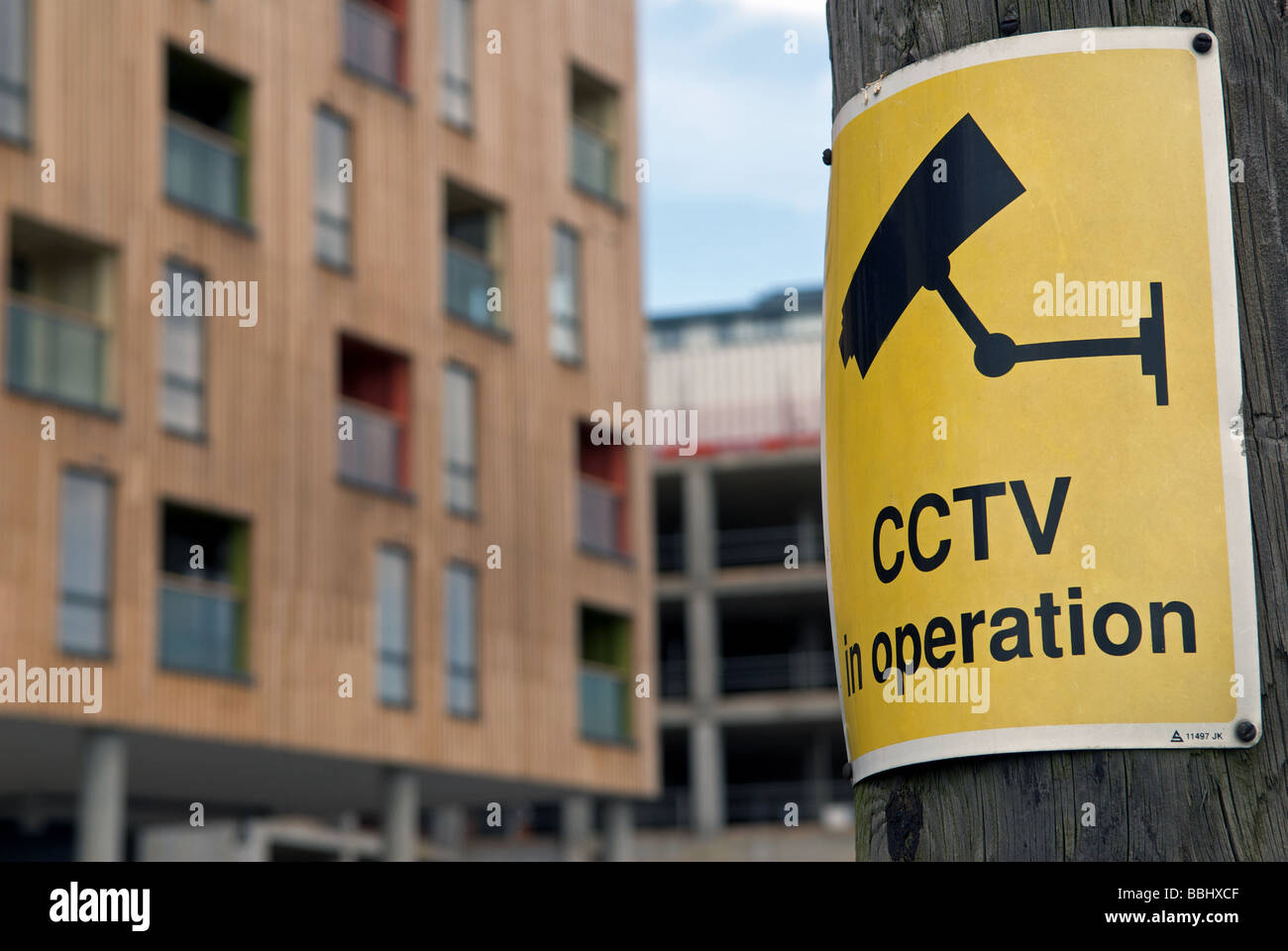 CCTV cameras in operation warning sign on a construction site, Ipswich, Suffolk, UK. Stock Photo
