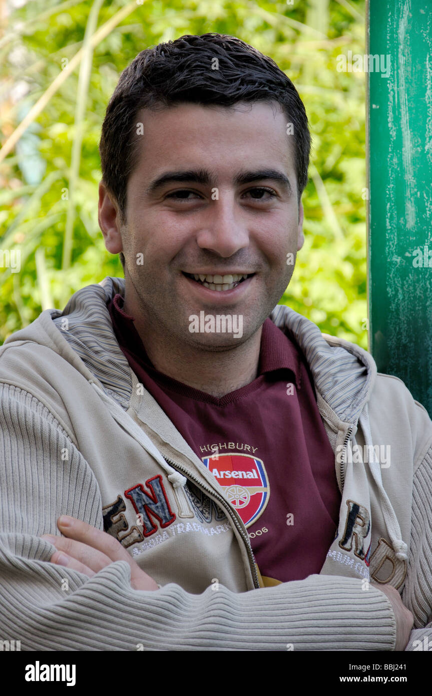 Smiling young Turkish man, Marmaris, Datca Peninsula, Mulga, Turkey Stock Photo