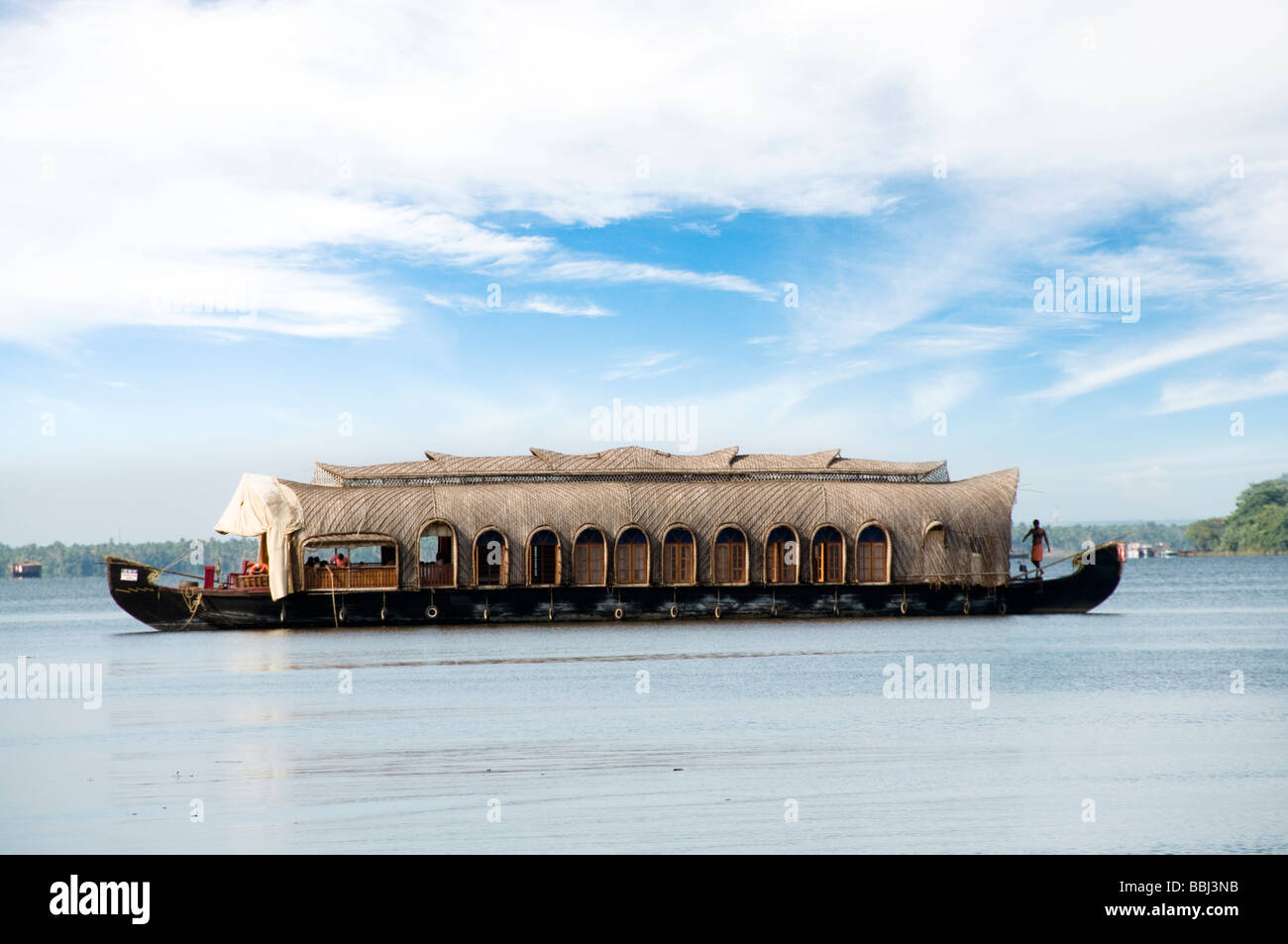 Houseboat with tourists in Backwaters of Kerala, India Stock Photo