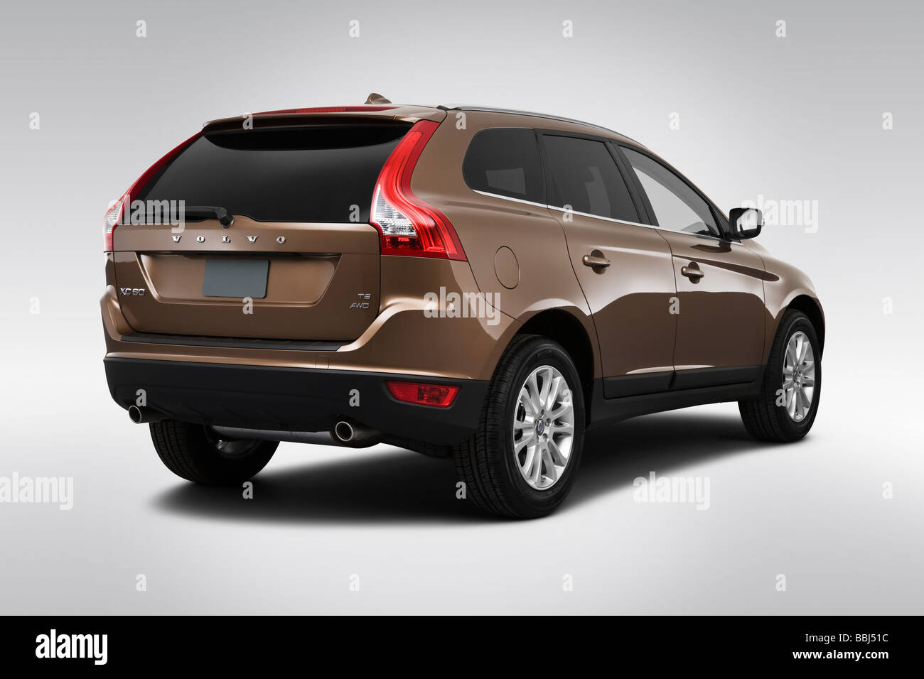 2010 Volvo XC60 T6 AWD in Beige - Rear angle view Stock Photo