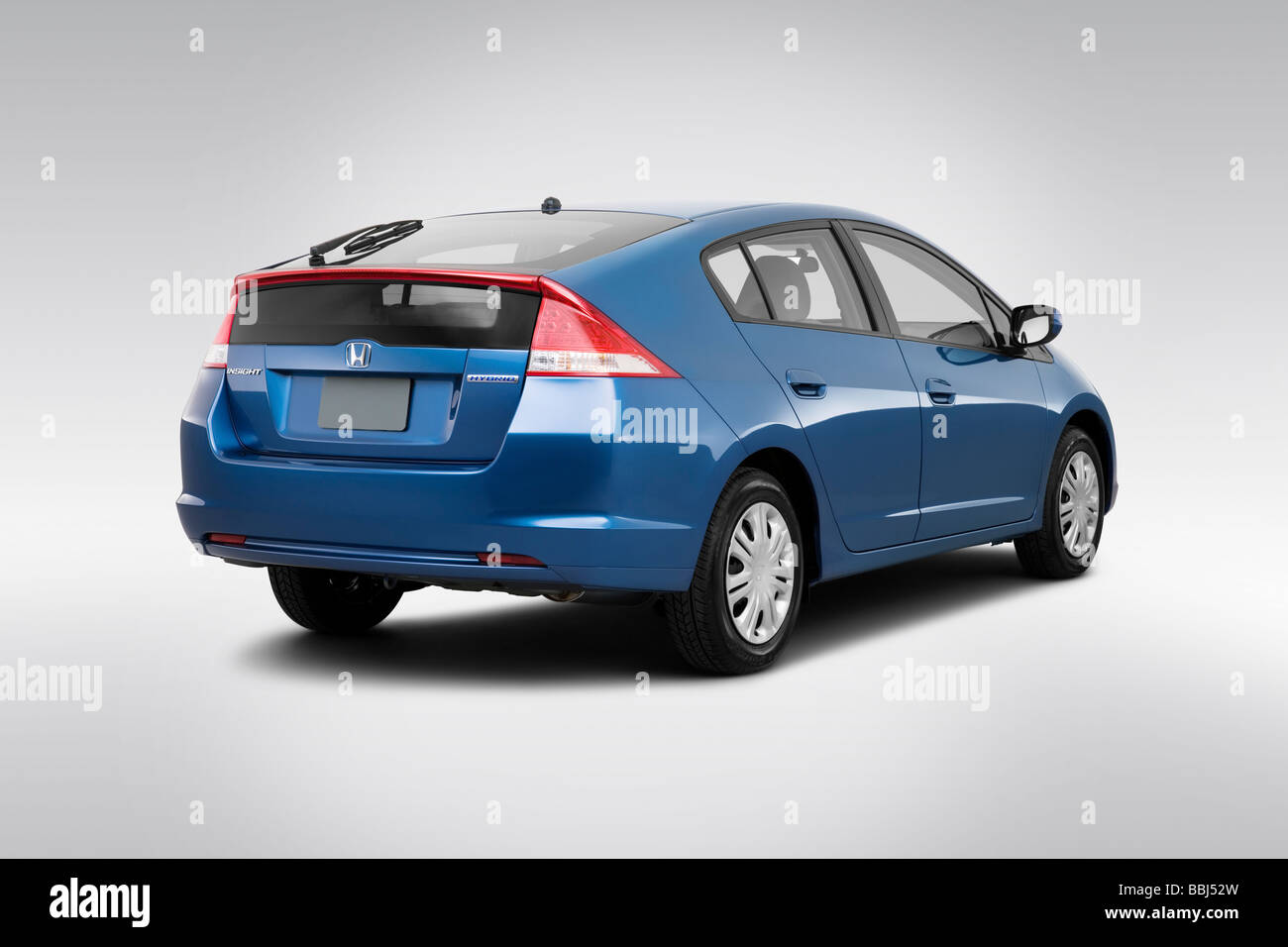 2010 Honda Insight Hybrid LX in Blue - Rear angle view Stock Photo