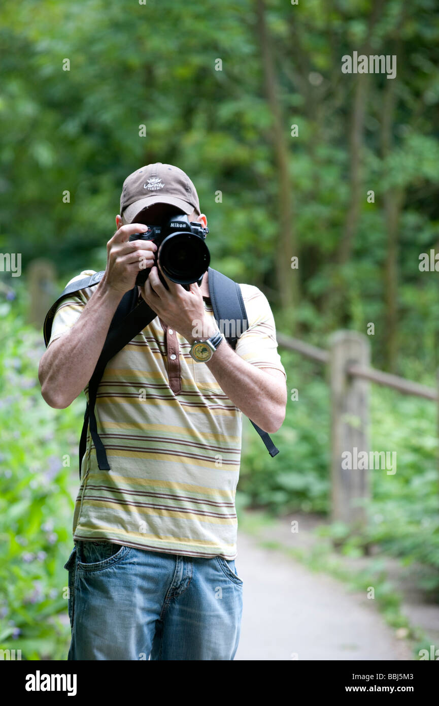 Man using camera Stock Photo