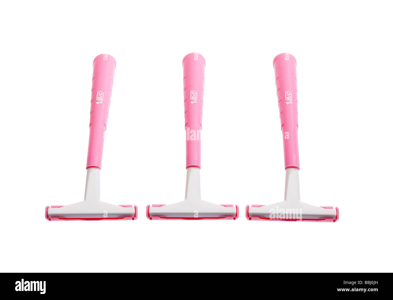 Three pink disposable razors Stock Photo