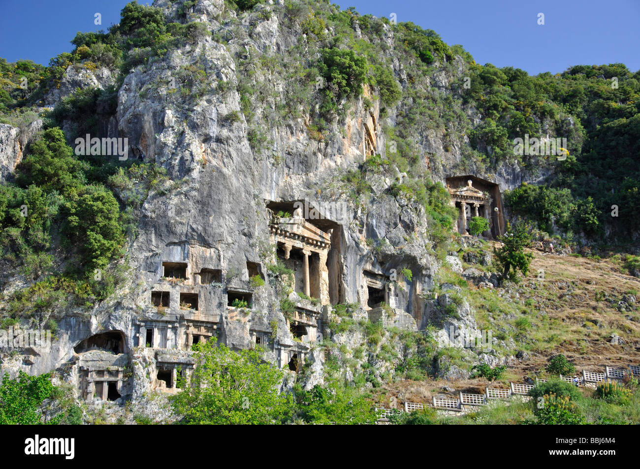 Lycian Tombs cut into cliffs, Fethiye, Mugla Province, Republic of Türkiye Stock Photo