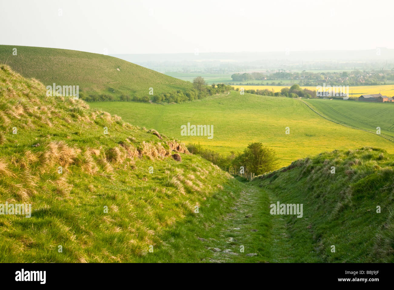 Looking back down the footpath on the way to the top of Tan Hill near Alton Barnes in Wiltshire Stock Photo