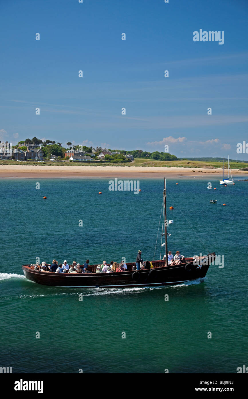 Excursion tour boat heading out of North Berwick harbour, East Lothian, Scotland, UK, Europe Stock Photo