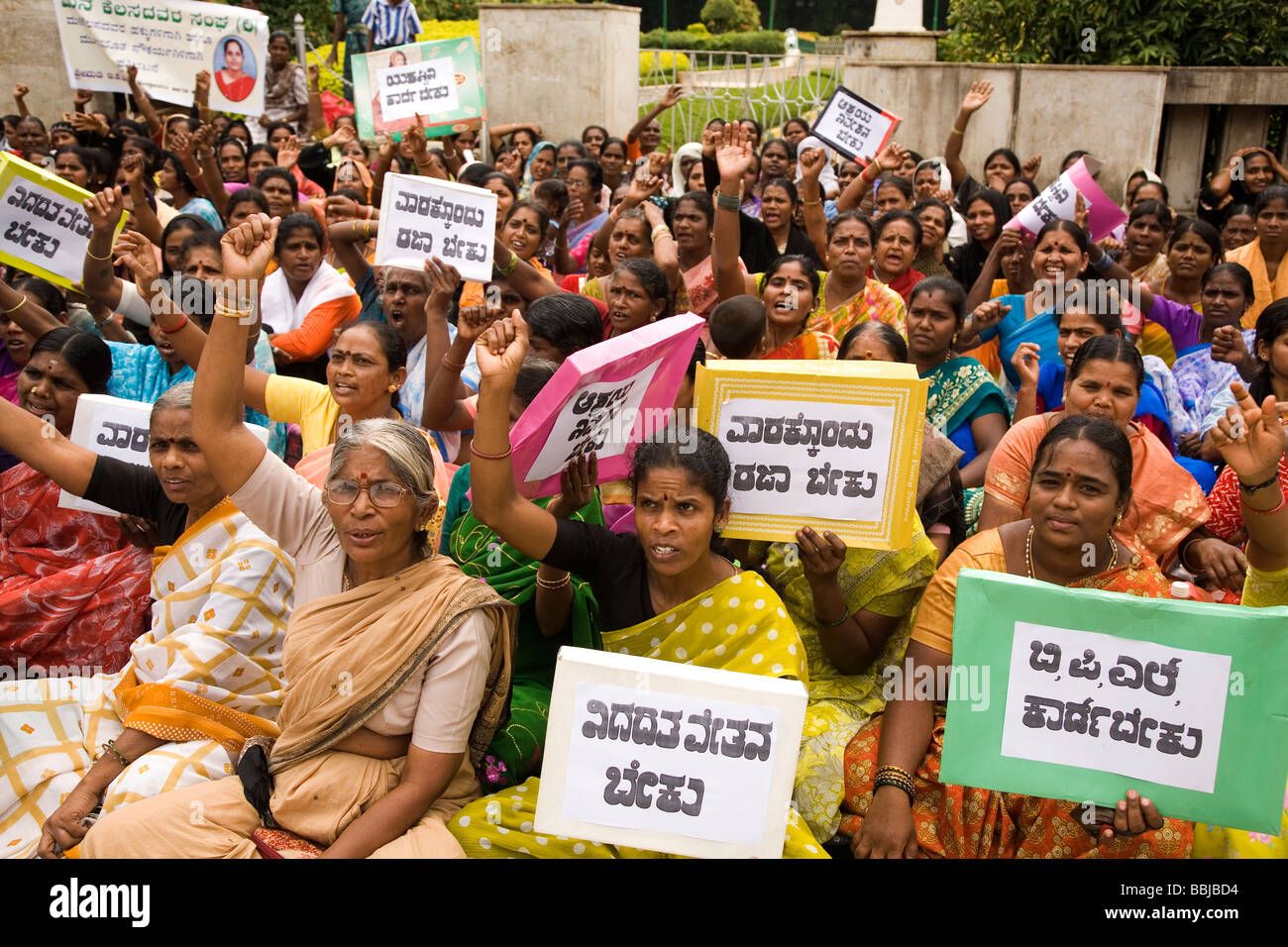 Women hold placards during a protest in Bangalore, India. The women are demostrating for women's and dalit (untouchable) rights. Stock Photo