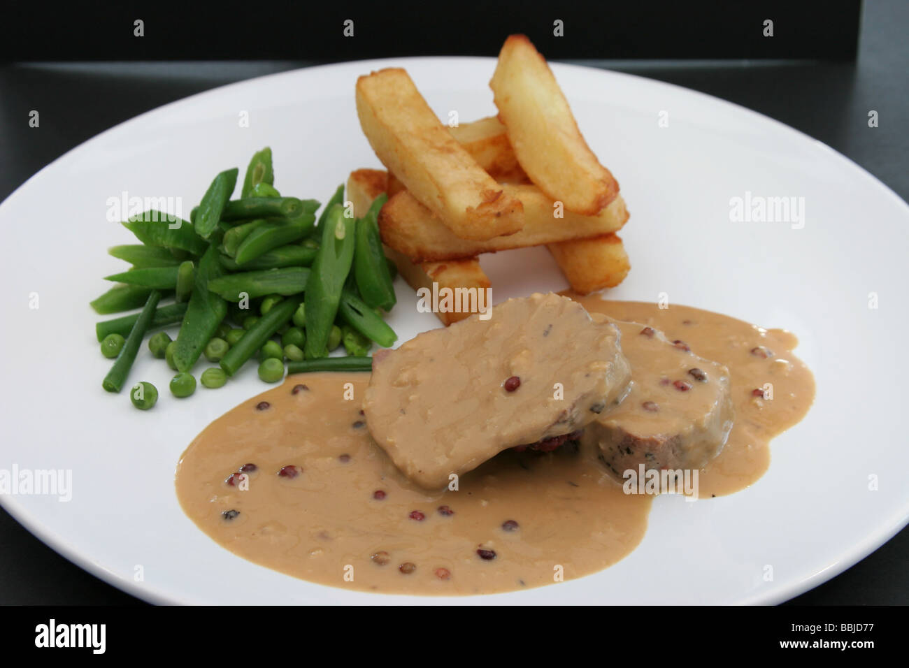 rump steak and armagnac and pink peppercorn sauce Stock Photo