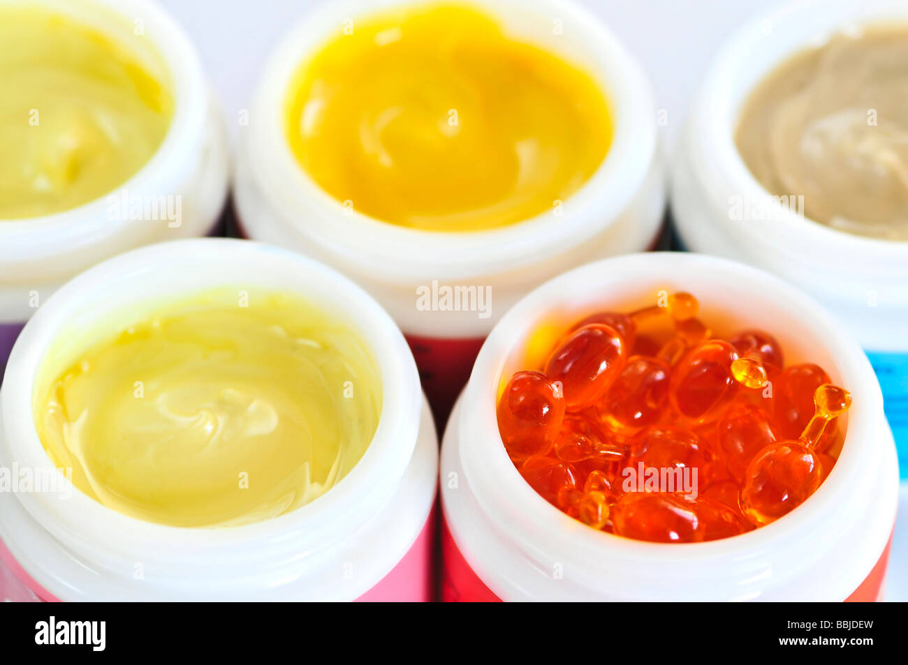 Colorful jars of skin care creams and lotions Stock Photo Alamy