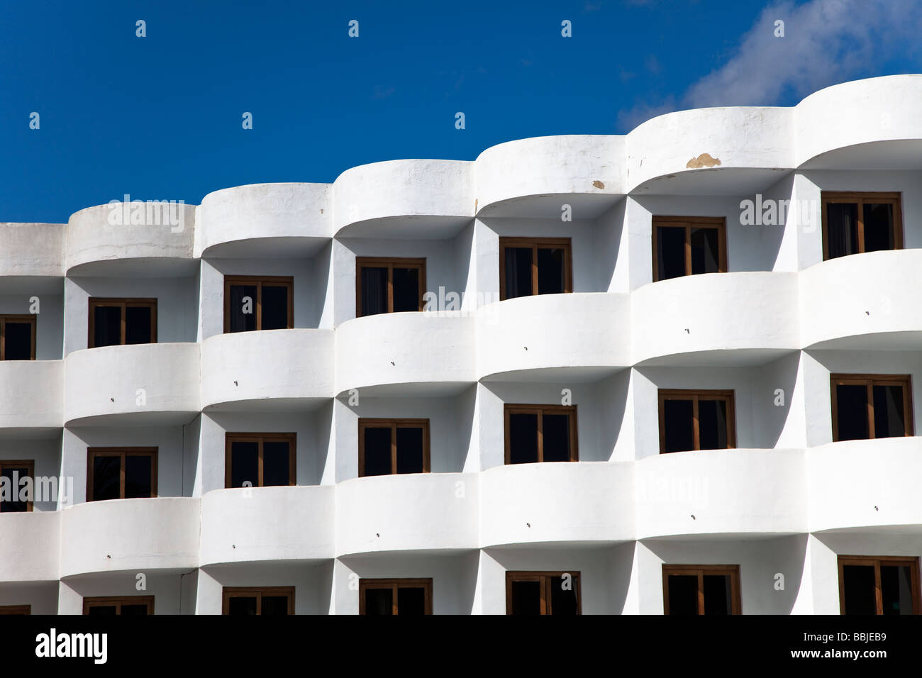 Concrete balconies in modern hotel development in poor condition requiring painting Cala d'Or Mallorca Spain Stock Photo