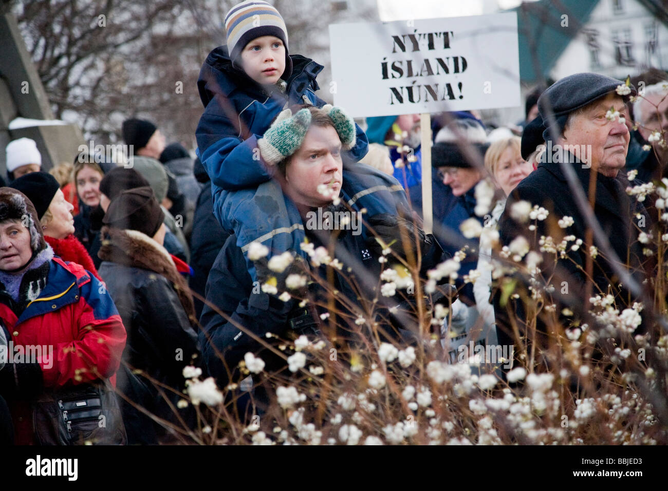 Demonstrators in front of Althingi, Icelandic parliament, at Austurvöllur.  Downtown Reykjavík Iceland Stock Photo