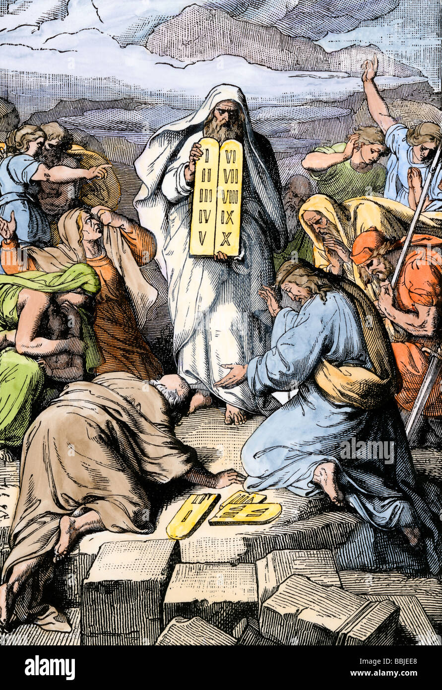 Moses giving the tablets with the Ten Commandments to the people of Israel. Hand-colored woodcut Stock Photo