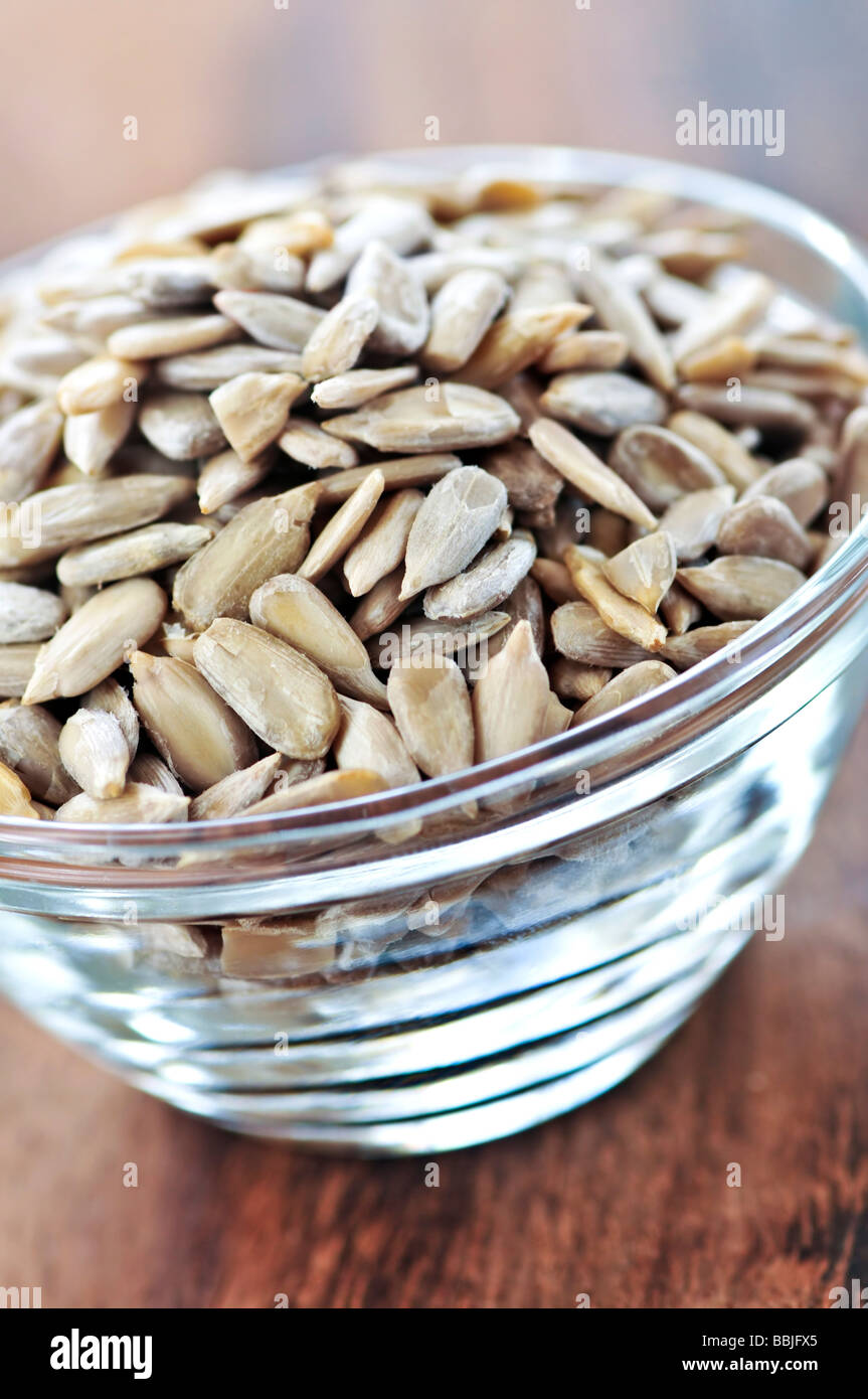 Shelled sunflower seeds close up in glass bowl Stock Photo