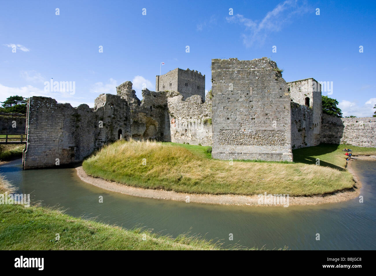 The mainly medieval moat and inner walls surrounding the Norman keep