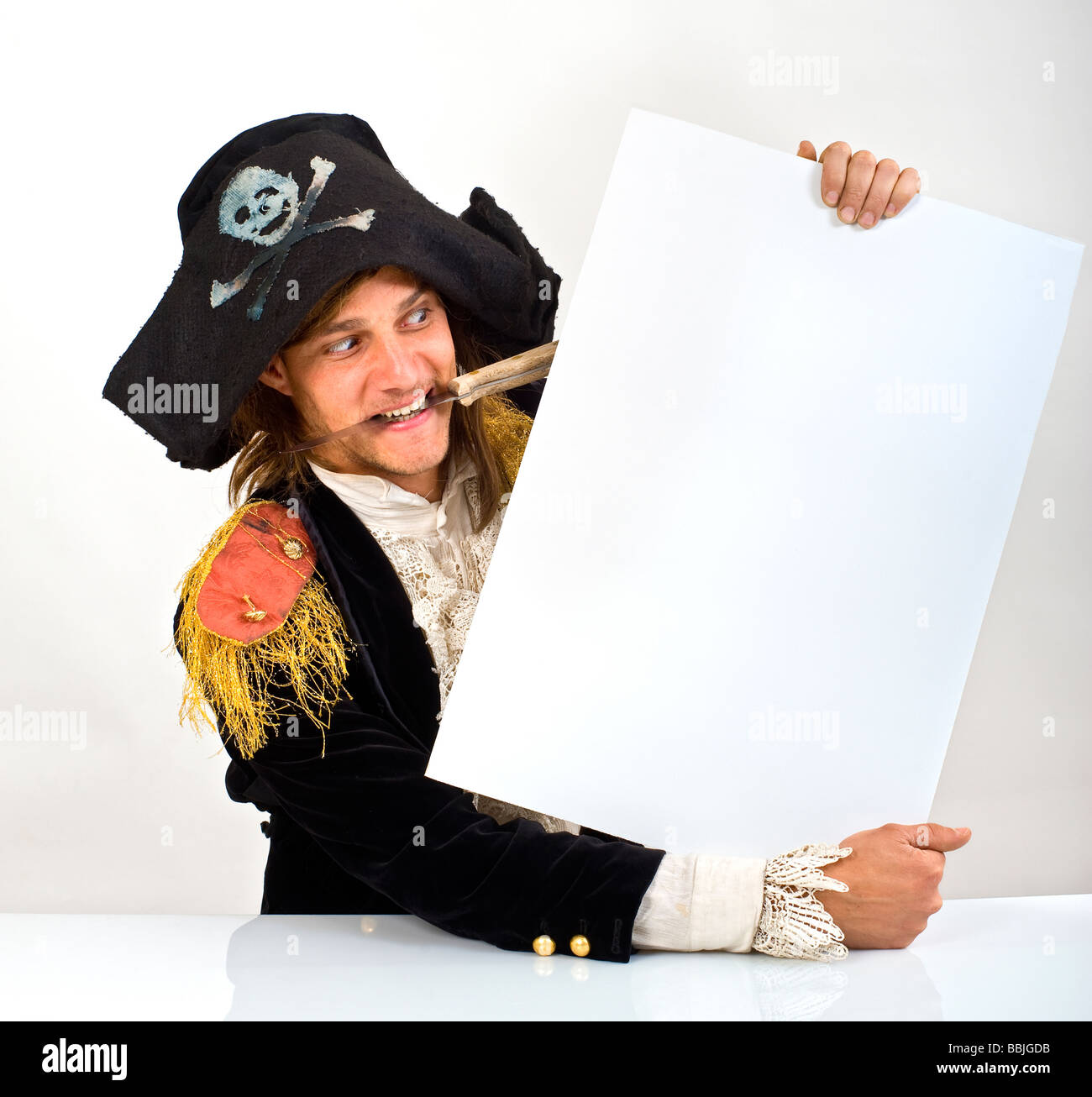 Man holding knife in mouth hires stock photography and images Alamy