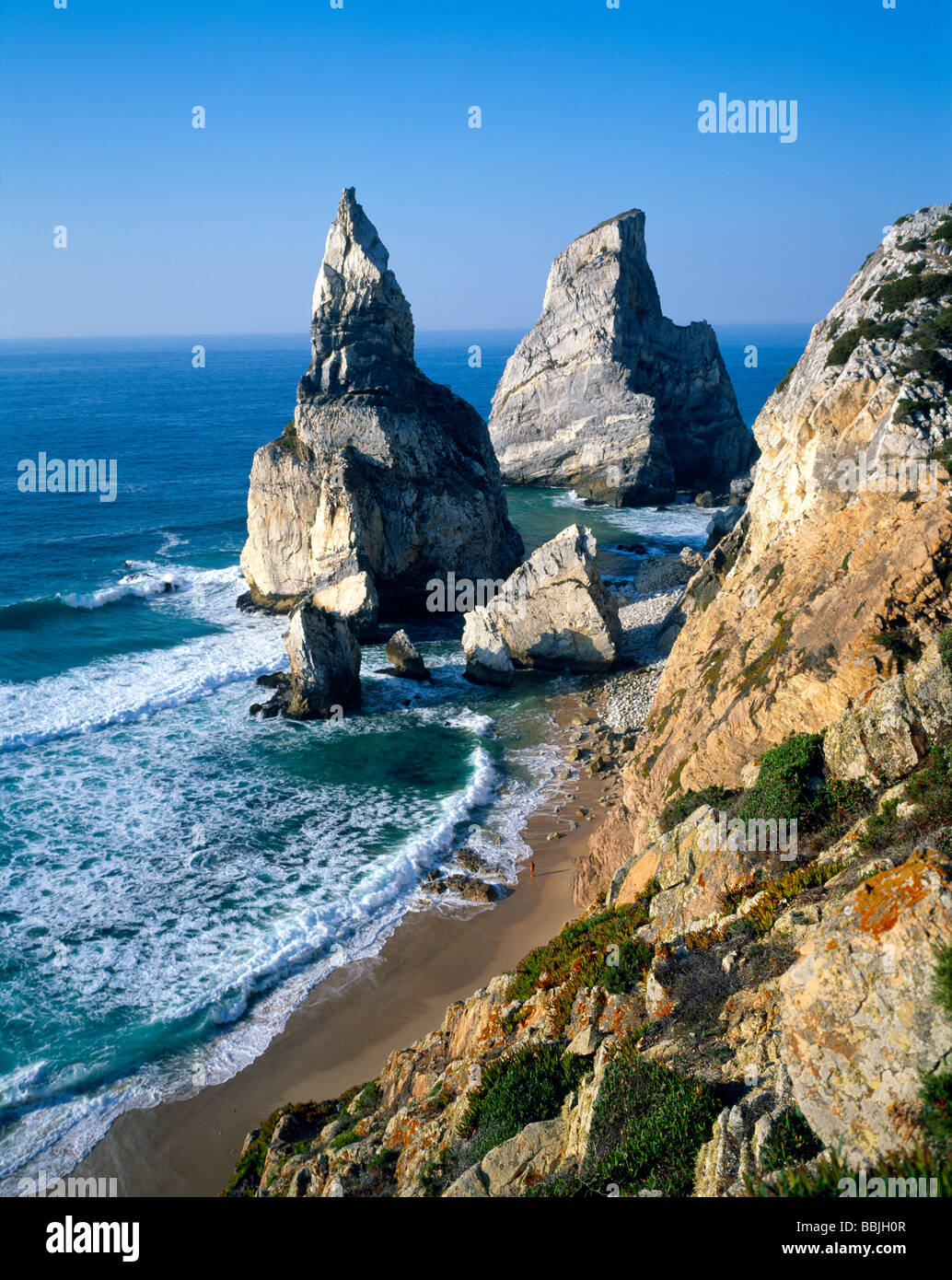 Beautiful high erected rocks on the wild steep coast of the Atlantic Ocean Felsen an einsamer wilder Steilküste im Atlantik Stock Photo
