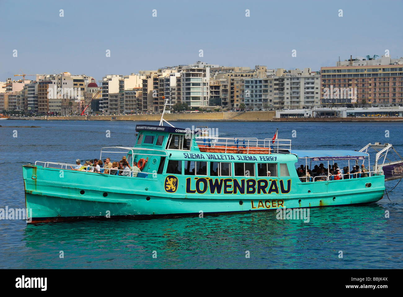 MALTA. The Valletta to Sliema passenger ferry in Marsamxett Harbour, with Sliema behind. 2009. Stock Photo