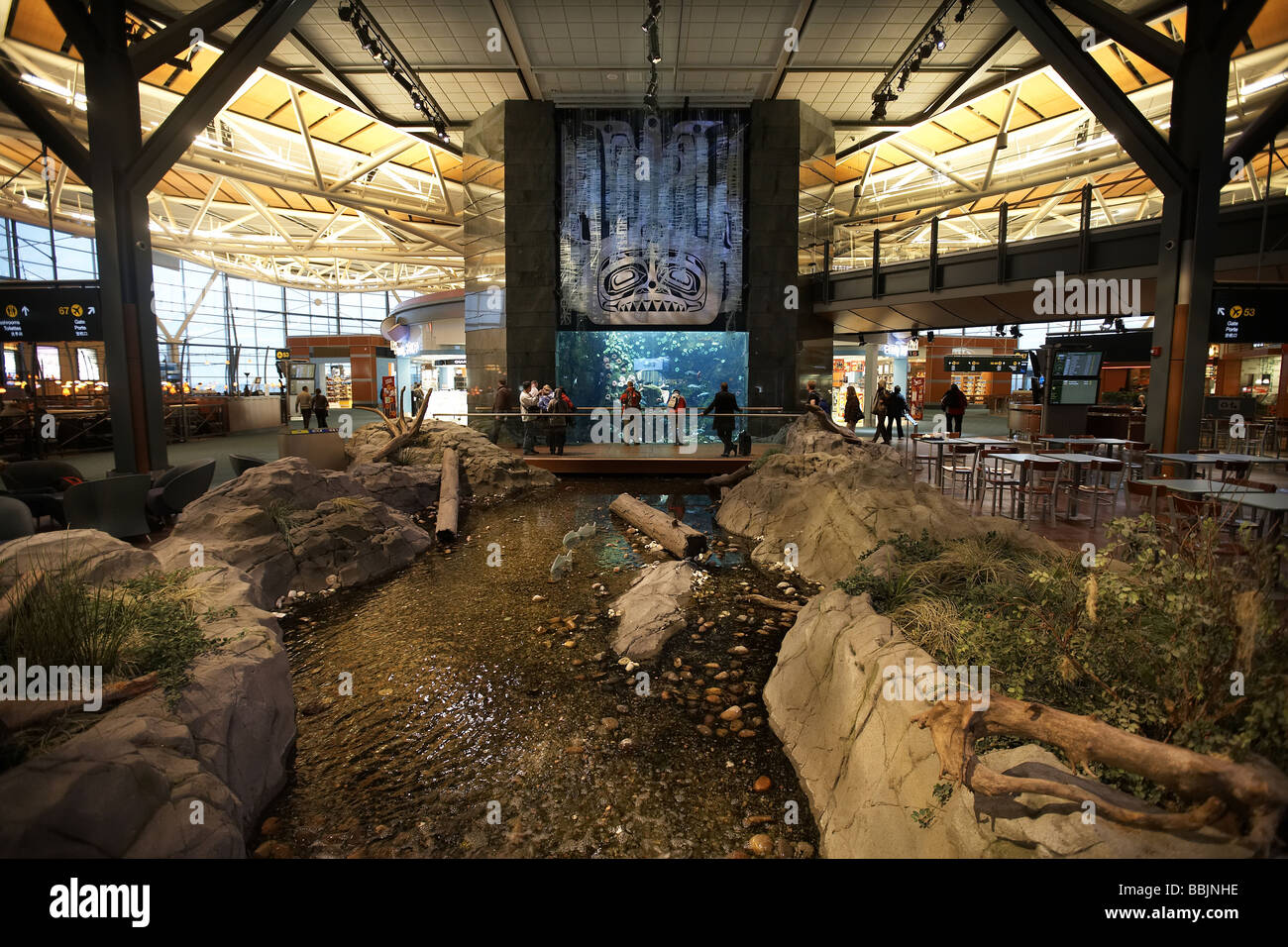 Aquarium and stream feature in the departure terminal Vancouver international airport British Columbia Canada Stock Photo