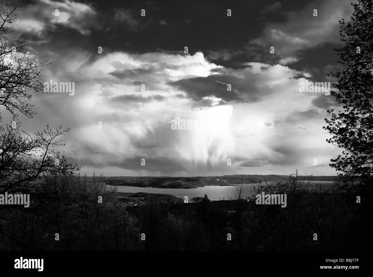 Black and White landscape image of dramatic clouds over the Oslo Fjord