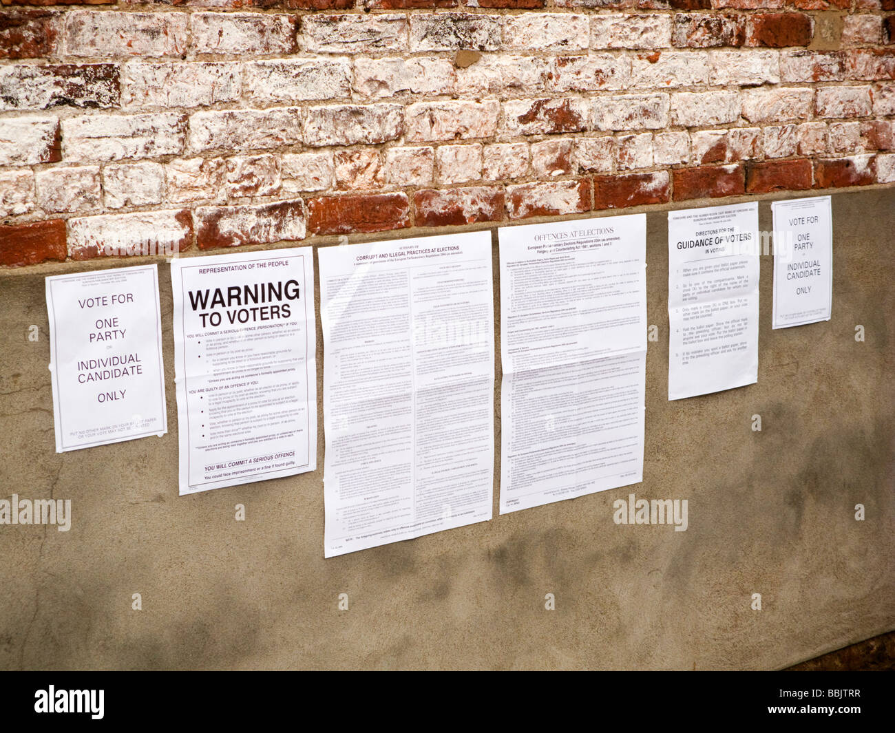 Legal notices for voters outside a polling station England UK Stock Photo