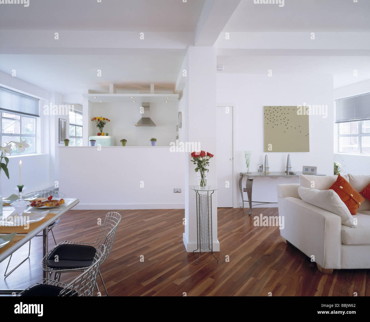 View of large open plan modern apartment city living London wooden floor bright ...