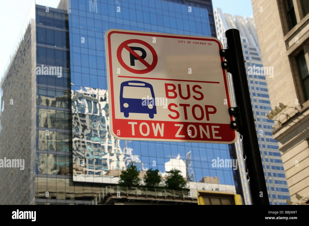 Chicago bus stop and tow away zone sign in the city center Stock Photo