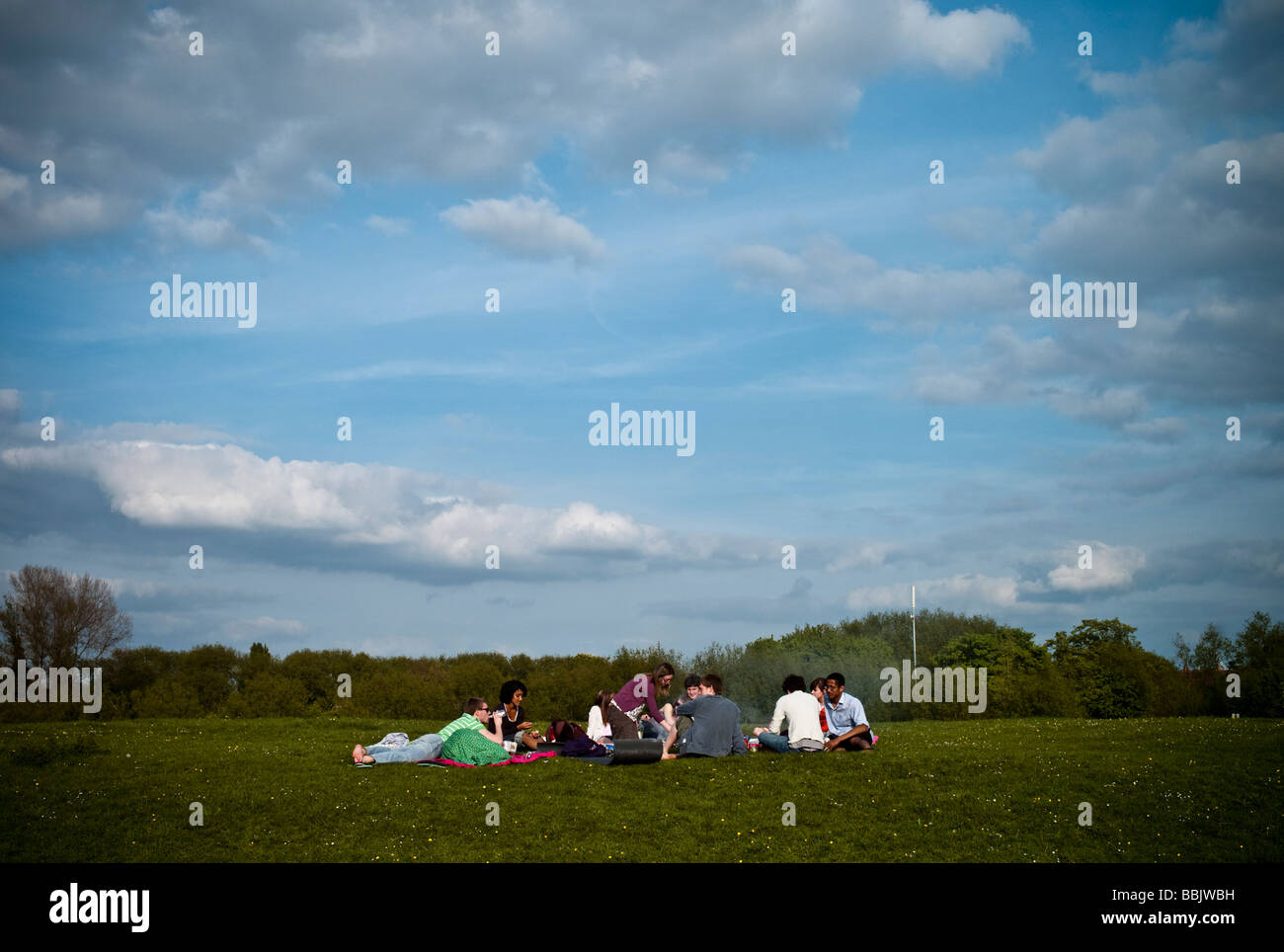 University students relaxing having a picnic and barbecue on the Port