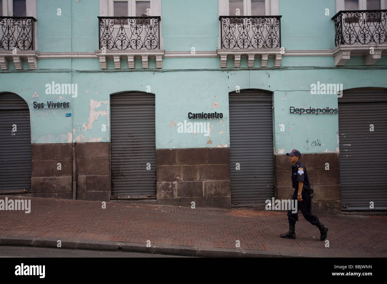 San Francisco de Quito, Ecuador; View of policeman walking on street Stock Photo