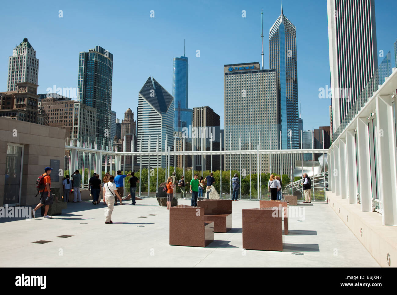 CHICAGO Illinois Visitors enjoy skyline view from Bluhm Family Terrace in Modern Wing of Art Institute sculpture display Stock Photo