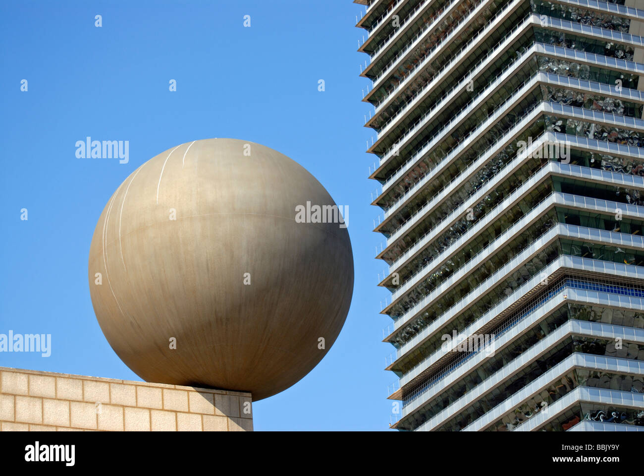 Frank Gehry s Sphere Esfera Sculpture and Mapfre Tower Building at Port Olimpic Barcelona s Waterfront Catalonia Spain Stock Photo