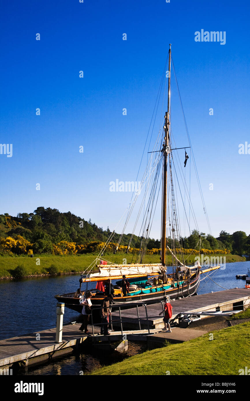 An old wooden yacht moored on the Caledonian Canal at Dochgarroch, Highland Region, Scotland. Stock Photo