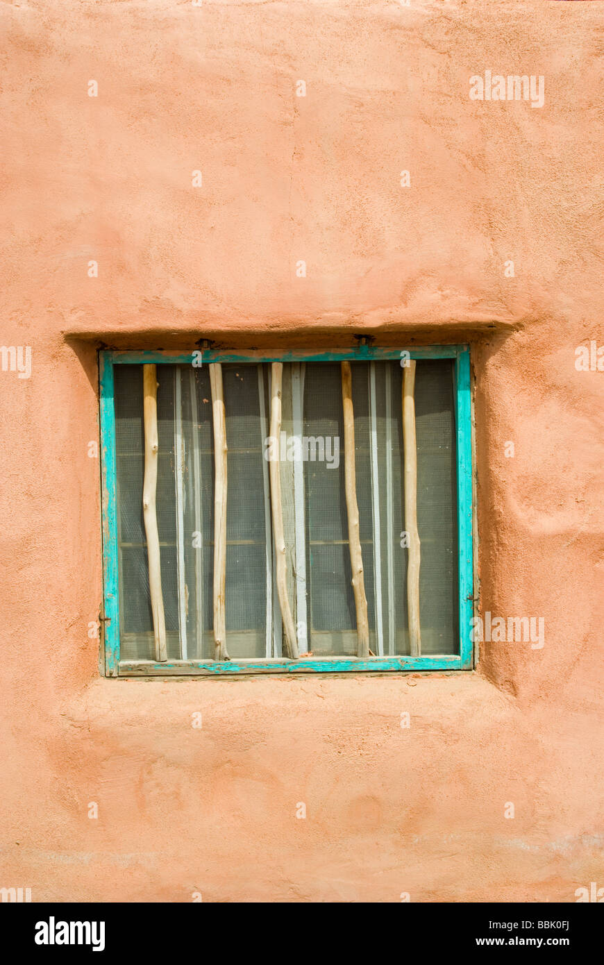 Adobe Building Windows USA New Mexico Taos Pueblo Adobe building window with wooden bars aqua ...