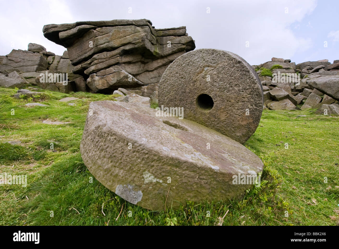 Old abandoned millstone in the peakdistrict Derbyshire England Stock Photo