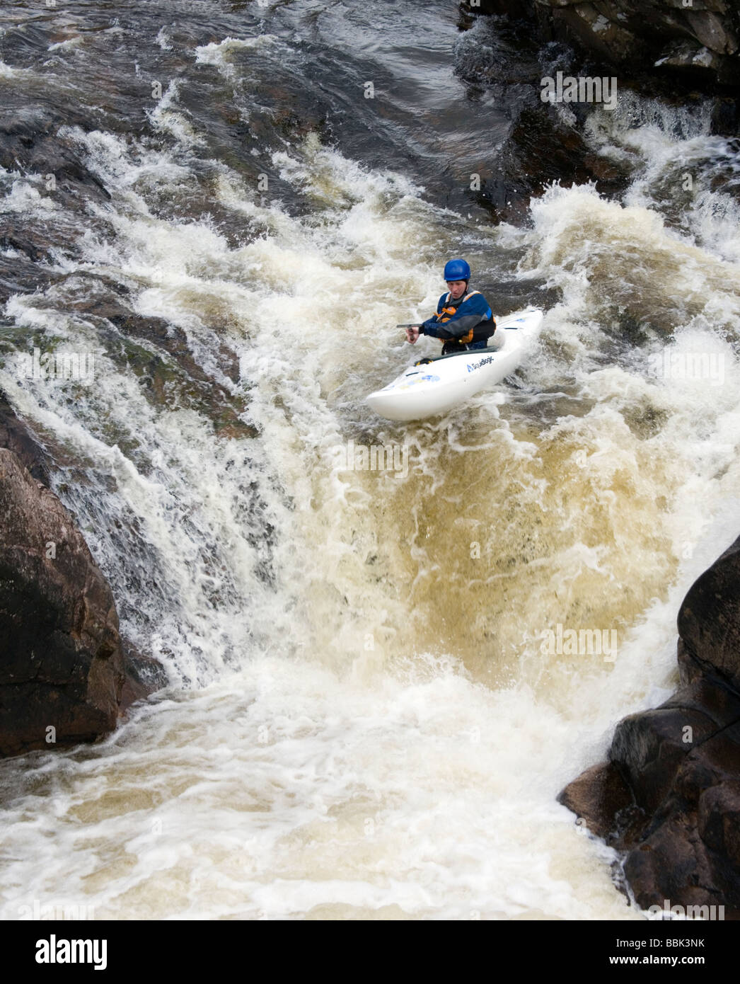Kayak on a white water river in Glen Etive, Scotland Stock Photo