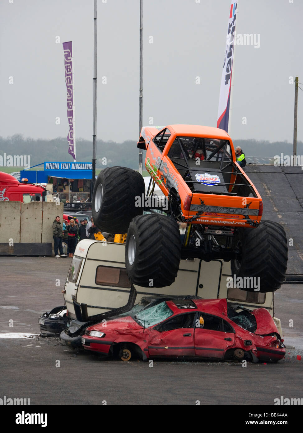 Monster Truck Podzilla Jumping over cars at the Easter Thunderball event in Santa Pod, England. Stock Photo